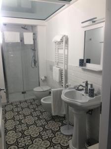Koupelna v ubytování B&B dai Mimmi