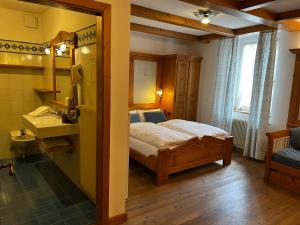 Postel nebo postele na pokoji v ubytování KAISERKRONE CHARMING RETREAT