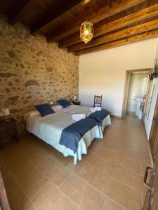 Posteľ alebo postele v izbe v ubytovaní Habitación rural en Posada Los Caballos