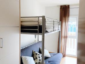 Posteľ alebo postele v izbe v ubytovaní Sunset Bay Vilanova
