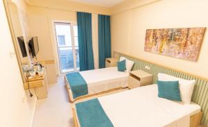 Postel nebo postele na pokoji v ubytování LEVANT HOTEL&APARTS