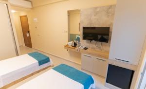 Postel nebo postele na pokoji v ubytování LEVANT HOTEL&APARTS