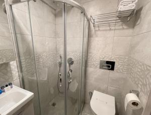 Koupelna v ubytování LEVANT HOTEL&APARTS
