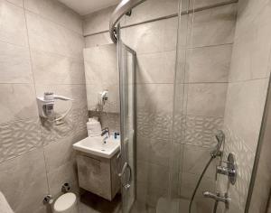 Koupelna v ubytování LEVANT HOTEL&APARTS
