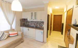 Kuchyň nebo kuchyňský kout v ubytování LEVANT HOTEL&APARTS