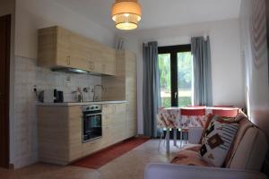 Кухня или мини-кухня в Appartamento 11 - Complesso Residenziale Terme di Casteldoria
