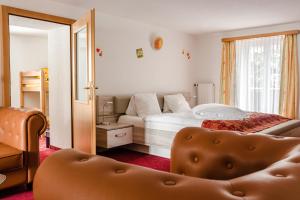 Ένα ή περισσότερα κρεβάτια σε δωμάτιο στο Family Hotel Desirée