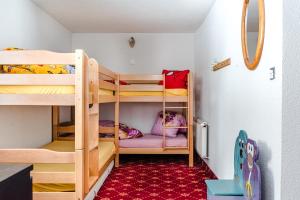 Ένα ή περισσότερα κρεβάτια σε δωμάτιο στο Family Hotel Desirée