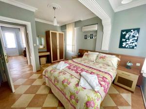 a bedroom with a large bed in a room at Mountain Valley Oludeniz in Oludeniz +116 photos