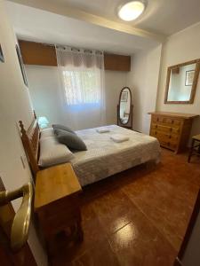 Posteľ alebo postele v izbe v ubytovaní Apartamento Rivas