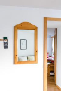 Ένα ή περισσότερα κρεβάτια σε δωμάτιο στο Family Hotel Desirée