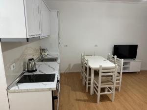 Kuchyň nebo kuchyňský kout v ubytování Espana aparthotel