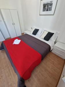 Postel nebo postele na pokoji v ubytování Hotel Migani