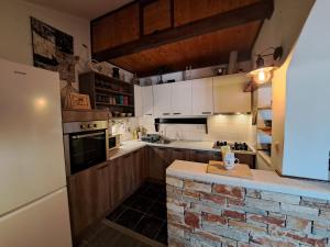 Kuchyň nebo kuchyňský kout v ubytování Apartment SEA VIEW