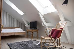 TV o dispositivi per l'intrattenimento presso Hotel Aahøj