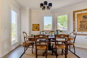 a dining room with a table and chairs at Mas provençal avec vue sur la Sainte Victoire in Aix-en-Provence