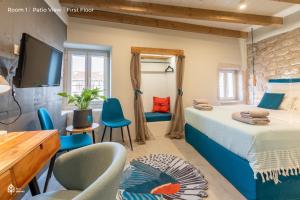 Postel nebo postele na pokoji v ubytování Casa Amando Eco Boutique House