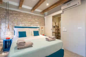Postel nebo postele na pokoji v ubytování Casa Amando Eco Boutique House