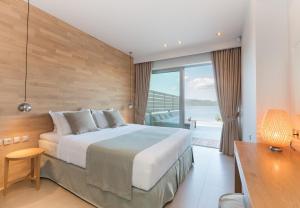 Ένα ή περισσότερα κρεβάτια σε δωμάτιο στο Villa Melia +9 φωτογραφίες