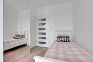 En eller flere senge i et værelse på Central Apartments-Gdansk&DG10/41