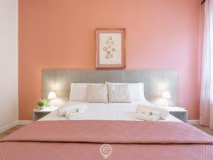 Säng eller sängar i ett rum på Cagliari Diamond Apartment
