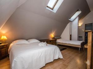 Posteľ alebo postele v izbe v ubytovaní Charmant duplex au cœur de Chamonix avec terrasse, wifi et parking - FR-1-343-183