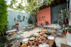 a table with many plates of food on it at Bouti Ayvalık in Ayvalık