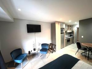 Køkken eller tekøkken på Modern Apartment in Stellenbosch