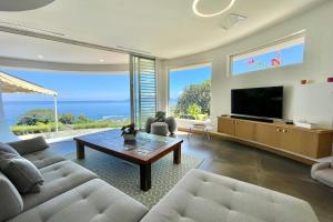 TV a/nebo společenská místnost v ubytování Villa Menemene one of a kind place in Tahiti