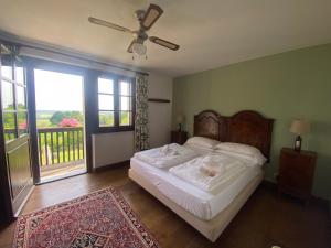 Postel nebo postele na pokoji v ubytování Agriturismo Scacciapensieri