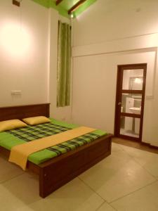Postel nebo postele na pokoji v ubytování Nilas Guesthouse
