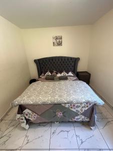 Posteľ alebo postele v izbe v ubytovaní Masion belle vue