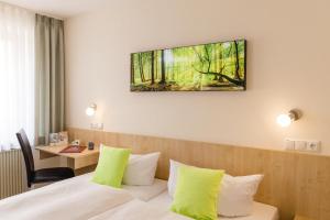 TV a/nebo společenská místnost v ubytování AKZENT Hotel Meerfräulein