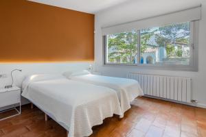 Postel nebo postele na pokoji v ubytování Sagulla