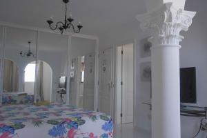 Postel nebo postele na pokoji v ubytování Tango House