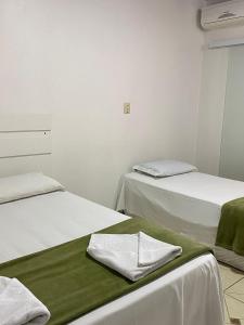Postel nebo postele na pokoji v ubytování Pousada Casa do Luiggi