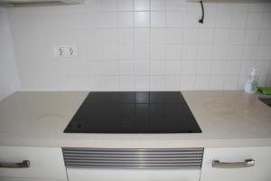 Kuchyň nebo kuchyňský kout v ubytování Casa Regalo