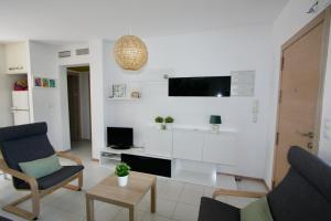 TV a/nebo společenská místnost v ubytování Casa Regalo