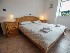 A bed or beds in a room at Luise - Four Towers Apartments
