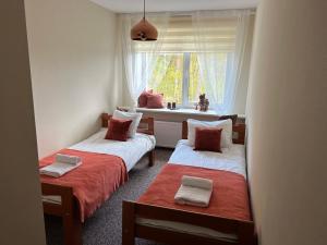 Postel nebo postele na pokoji v ubytování Hotel "Senleja"