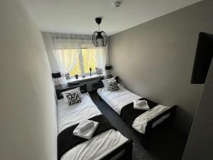 Postel nebo postele na pokoji v ubytování Hotel "Senleja"
