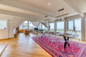 Le poséidon, gîte EXCEPTIONNEL face à la mer avec spa, terrasse, 4 chambres UN VRAI COUP DE COEUR的休息区