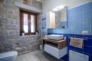Ένα μπάνιο στο Villa S'Olioni +38 φωτογραφίες