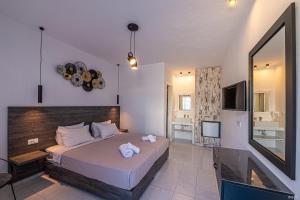 A bed or beds in a room at Katerina View
