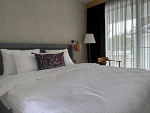 Postel nebo postele na pokoji v ubytování S-Cape Hotel Fethiye