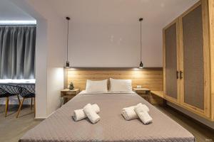 A bed or beds in a room at Katerina View