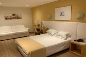 Кровать или кровати в номере Hotel Mare
