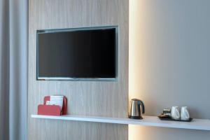 TV a/nebo společenská místnost v ubytování Holiday Inn Express Fürth by IHG