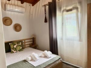 Posteľ alebo postele v izbe v ubytovaní Amaryllis apartments