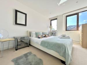 Ένα ή περισσότερα κρεβάτια σε δωμάτιο στο Beautifully Presented Apartment